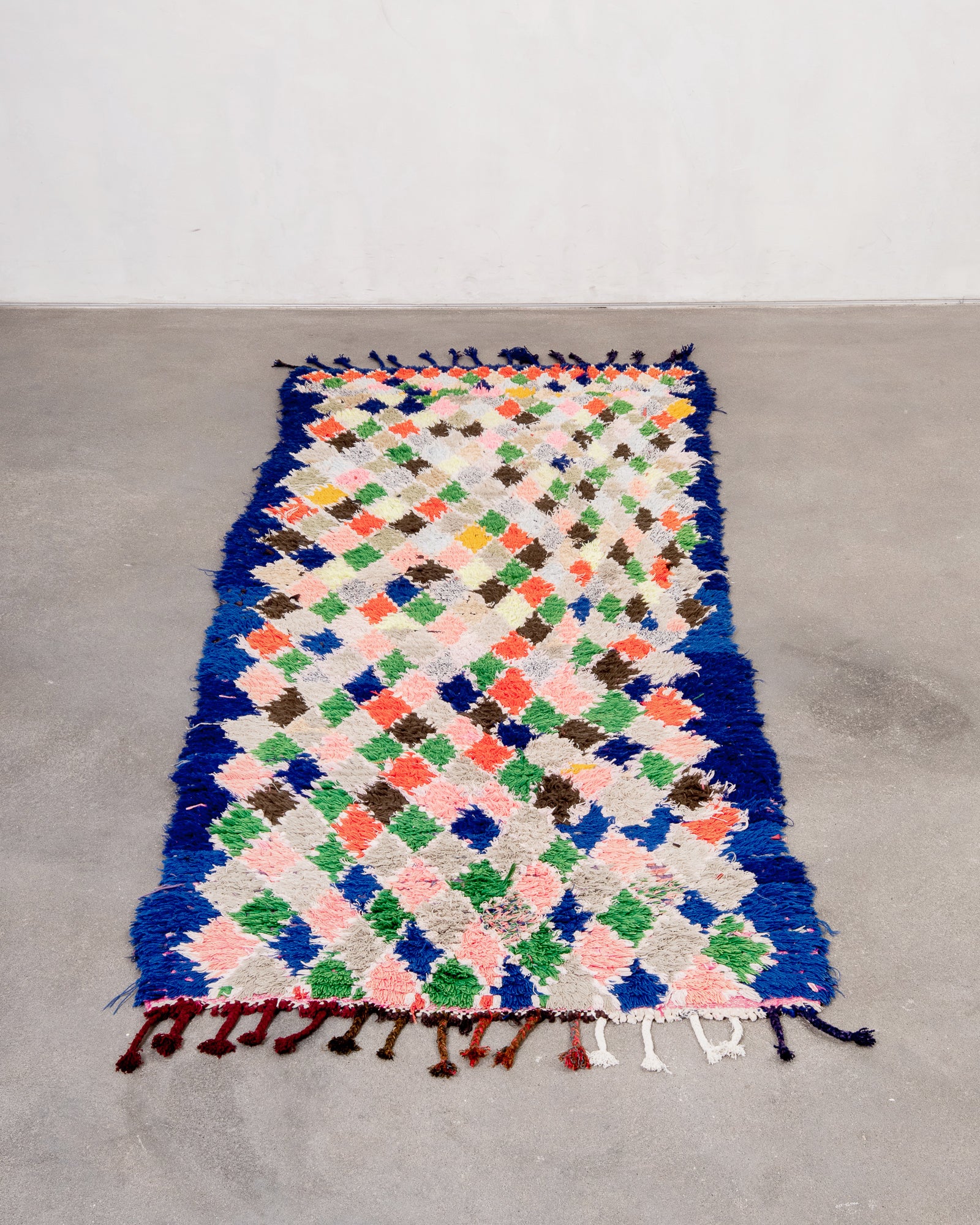 Modern, designer, handcrafted Berber rug from Morocco. Vintage carpet with beautiful colours and patterns and fluffy wool texture.